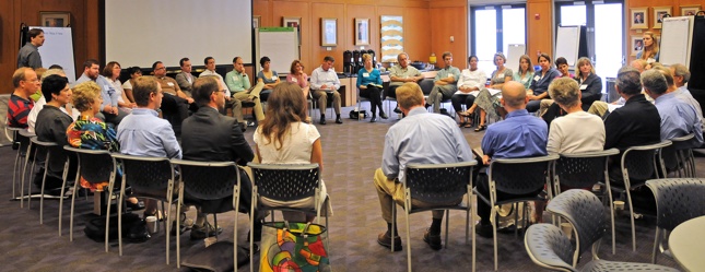 Photo of people meeting in a circle
