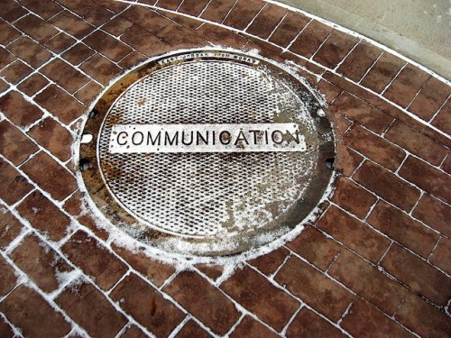 Photo of manhole cover with Communication written on it