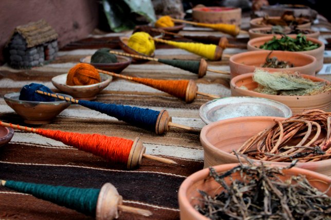 Photo of yarn and bowls in a market