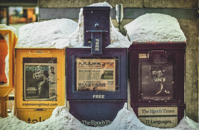 Newspaper stand in the snow