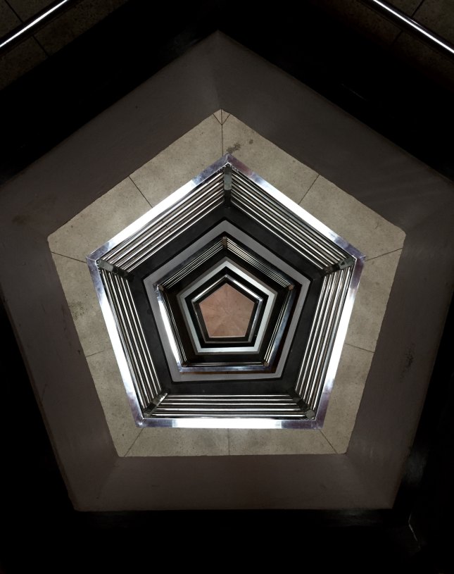 Photo of pentagonal view down a stairwell