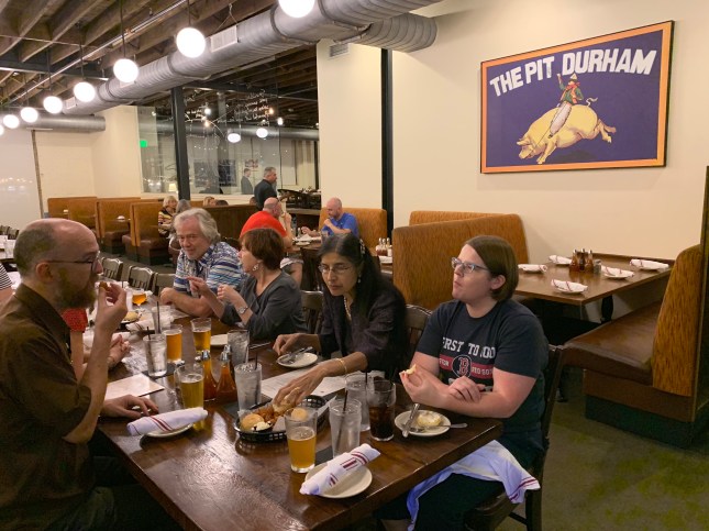 Photo of group eating NC BBQ at The Pit in Durham